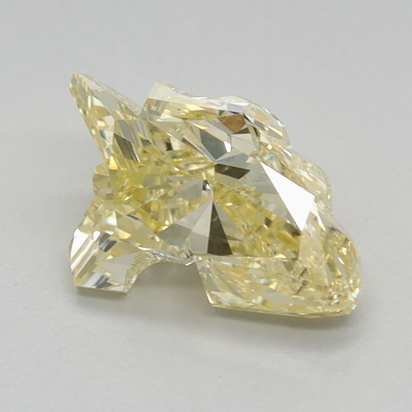 1.12 carat Fancy Intense Yellow Unicorn lab grown diamond, VS2, IGI certified